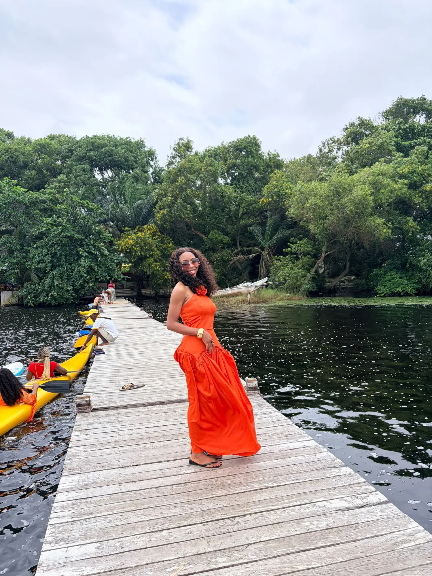 The lagoon: Boats, sails and a wooden jetty